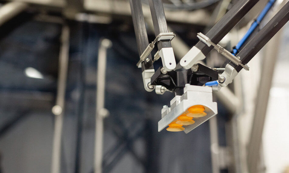 Automated sorting, inspection, and packaging of baked goods for retail